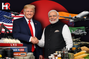 President Trump and Prime Minister Modi shaking hands at the 2026 Trade Summit, symbolizing the new $500 billion "Phase One" trade pact.
