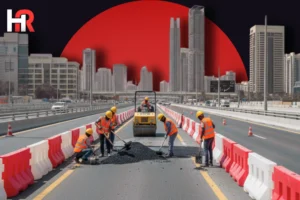 Dubai municipal workers resurfacing a road; before and after comparison of road repair in Dubai February 2026.