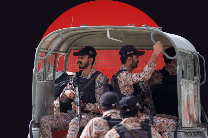 karachi rangers soldiers sitting in a moving vehicle along with a motorcycle on which two soldiers are escorting the vehicle