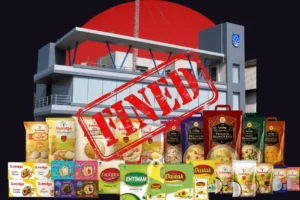 A composite image featuring a modern corporate building set against a large red circle and a dark background. A prominent, distressed red stamp reading 'FINED' is superimposed diagonally across the building's facade. In the foreground, there is a dense display of various packaged grocery products, including Sunridge brand flour, bags of premium basmati rice, boxes of biscuits, and Dastak cooking oil