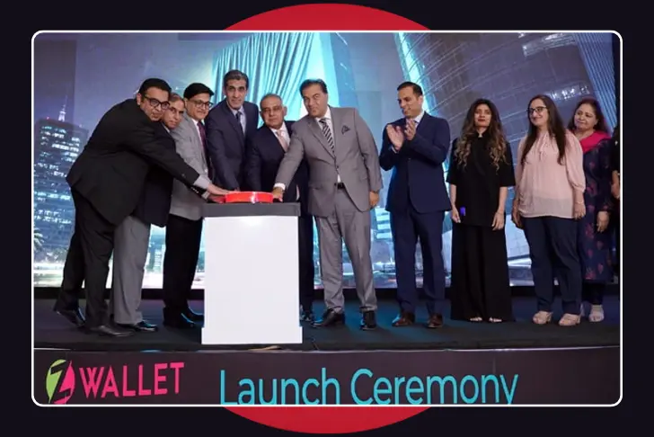 Corporate executives pressing a launch button on stage during the official Z Wallet launch ceremony, set against a red circle background.