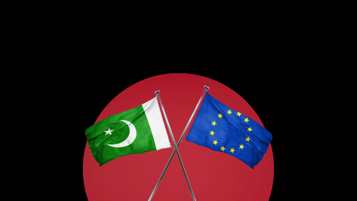 Crossed miniature flags of Pakistan and the European Union mounted on silver poles, set against a dark background featuring a massive solid red circle.